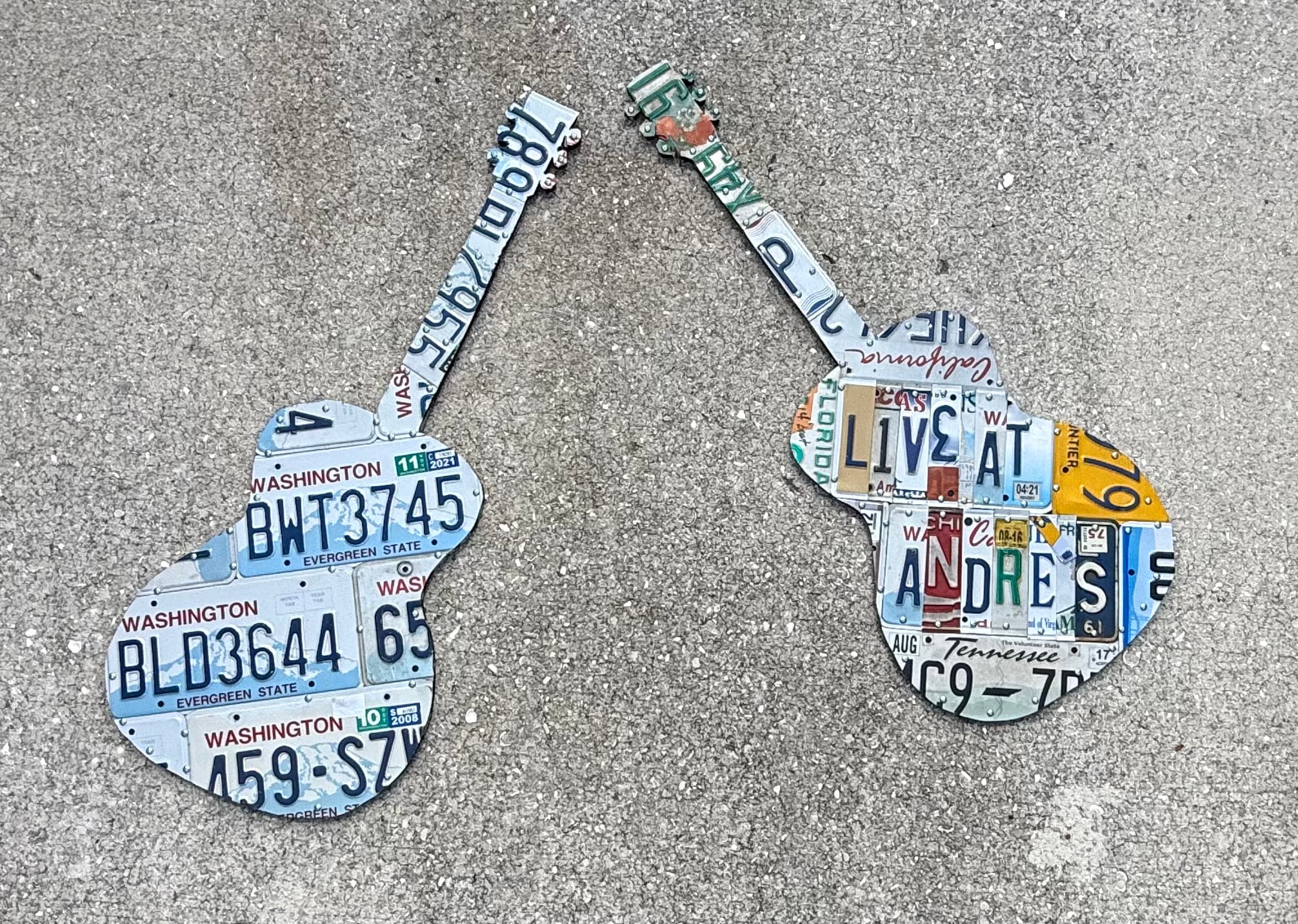 Dual guitars made from Washington and multi-state license plates