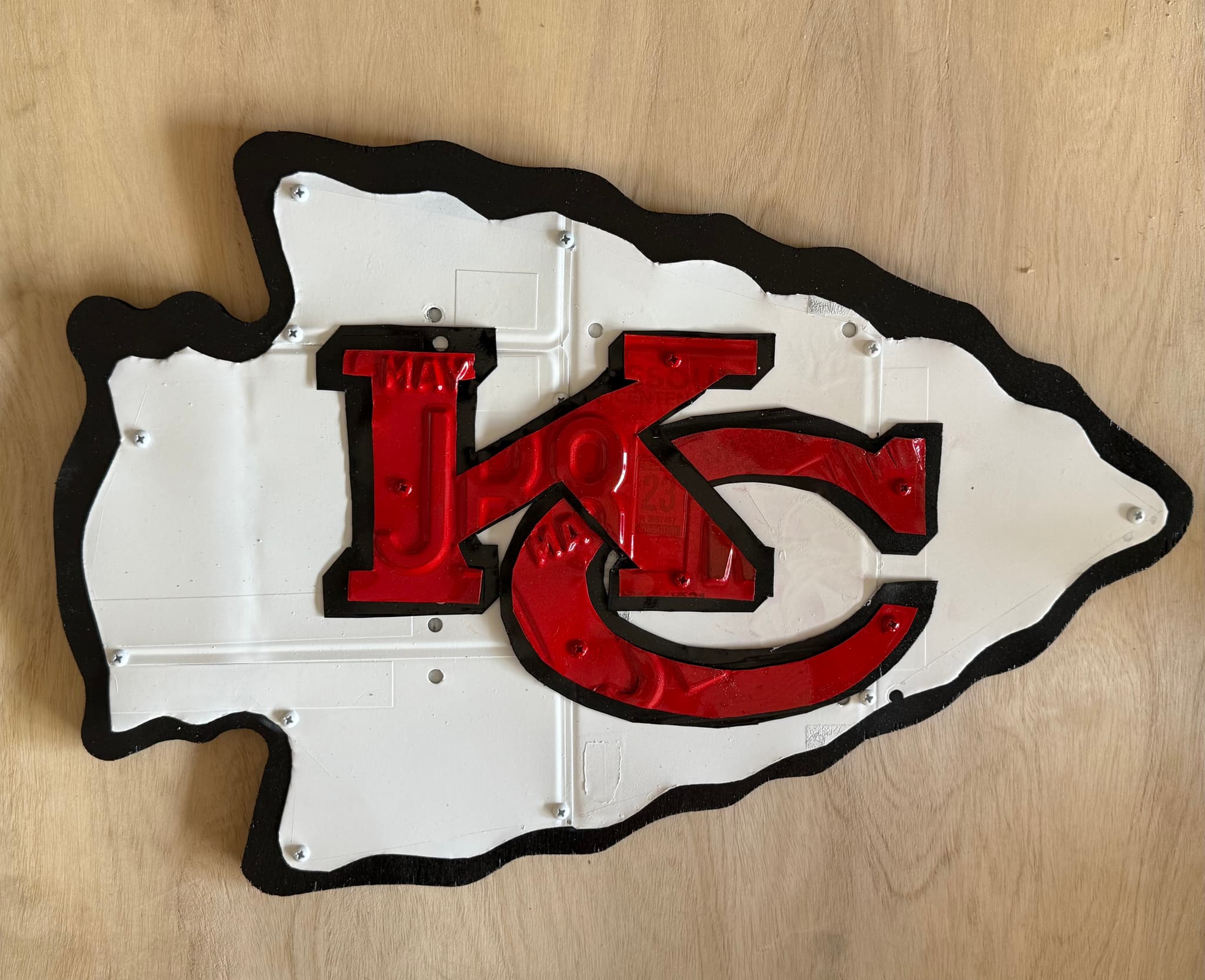 Man cave decorated with NFL license plate art